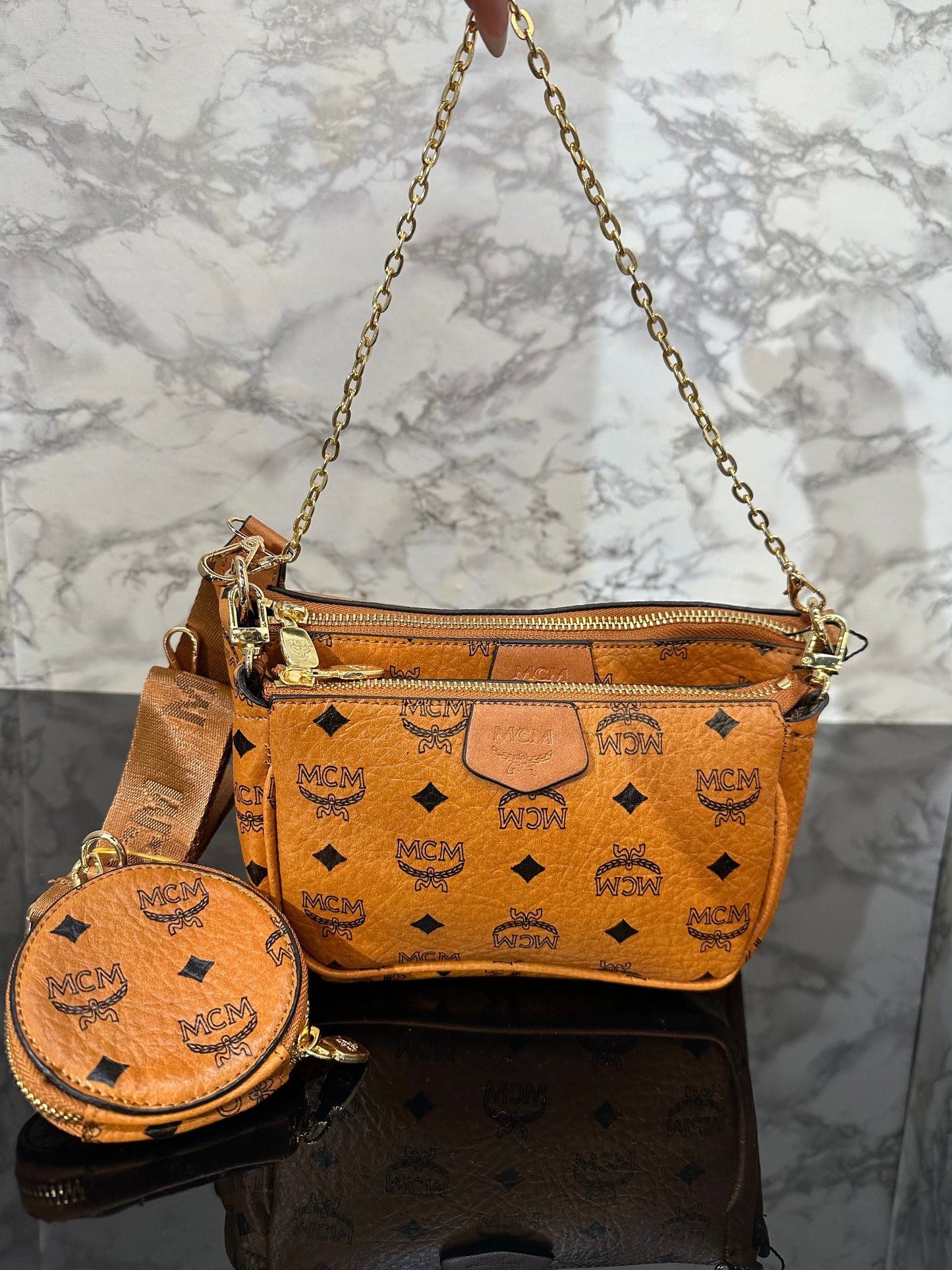 MCM ΤΣΑΝΤΑΚΙ